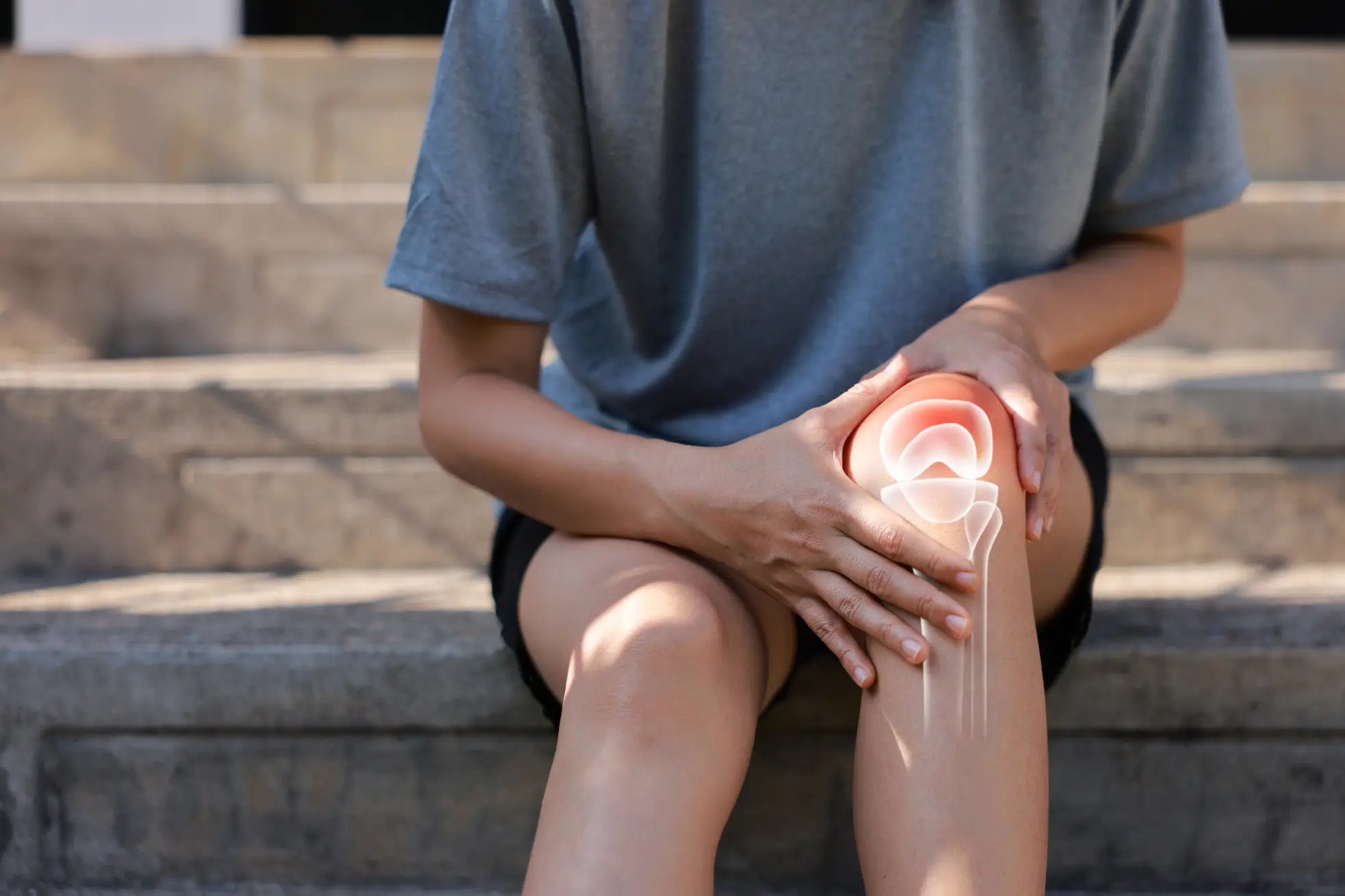 Woman suffering from knee pain