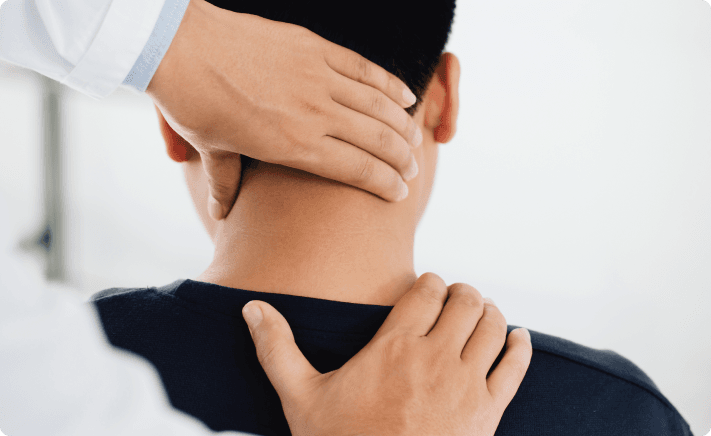 Doctor examining patient with neck pain