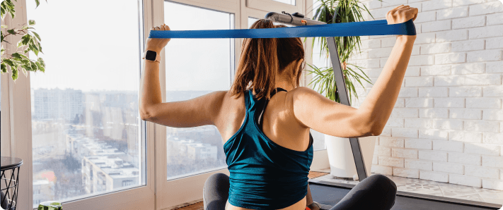 Person practicing good posture for sciatica prevention