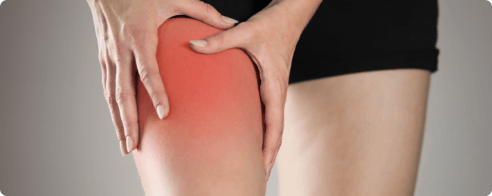 Person experiencing sciatica symptoms