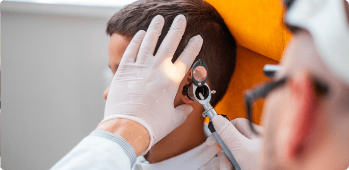 Doctor examining patient with trigeminal-neuralgia